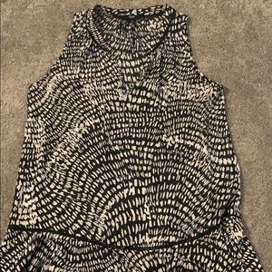 Black and white sleeveless blouse